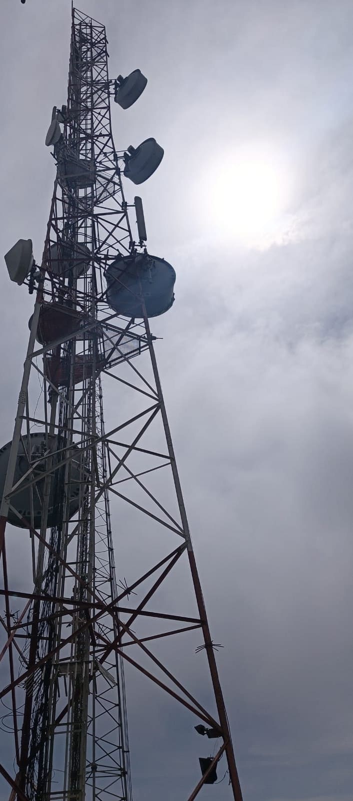 Gembe Hill, looking up a mast into the sun