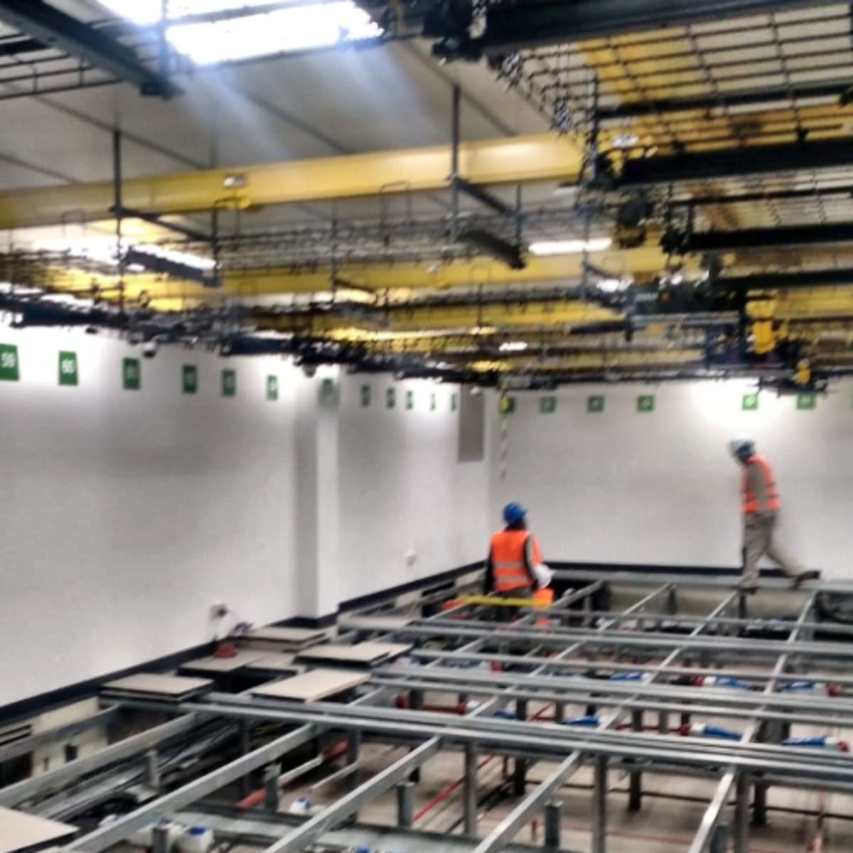 SimbaNet, raised floor pedestals going in